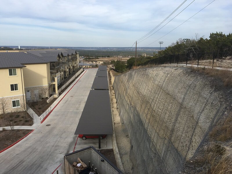 Rockfall drapery for parking lot protection